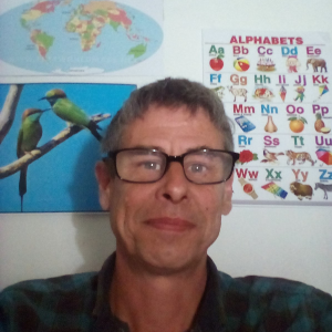 Neil E.