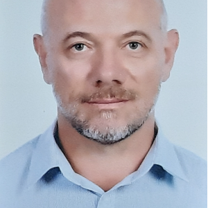 Giles B.
