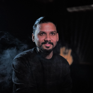 Sanjesh D.